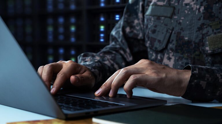 Military person using laptop